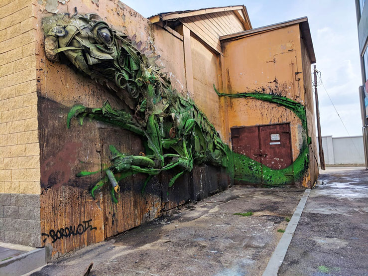 The neighborhood in San Nicolas is filled with unique art installations like this metal iguana by artist Bordalo II © Alicia Johnson / Lonely Planet