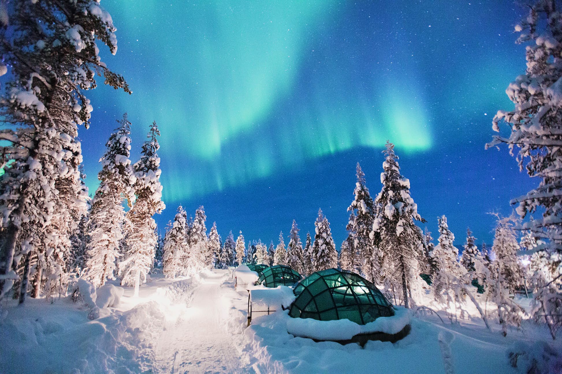 The magical Northern Lights put on a show over Finnish Lapland @ Courtesy of Kakslauttanen Arctic Resort