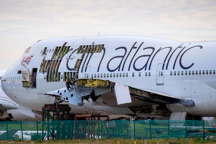 A Virgin Atlantic Boeing 747-400 aircraft partially dismantled at St. Athan airport in Cardiff, one of many retired early by a variety of airlines during the pandemic © Matthew Horwood / Getty Images