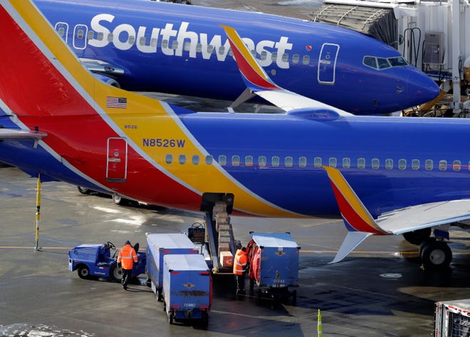 Southwest Airlines planes are loaded at Seattle-Tacoma International Airport on Feb. 5, 2019. Ted S. Warren, AP