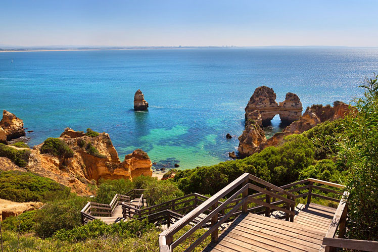 The Algarve's plethora of beautiful beaches and coastal views are perfect for scenic pitstops © Elena_Sistaliuk / Getty Images