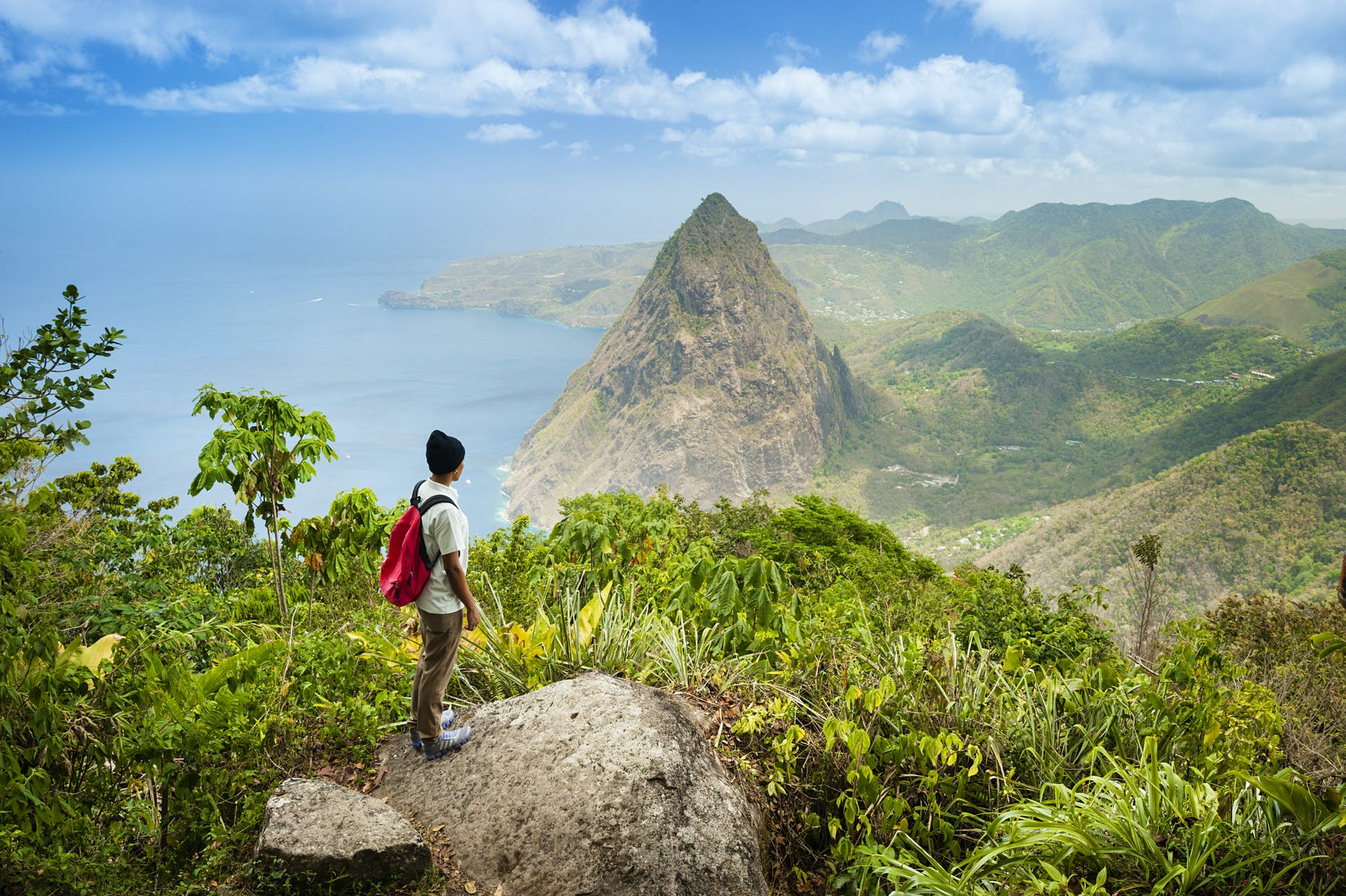 Hiker standing at lookout towards Gros Piton © Justin Foulkes / Lonely Planet